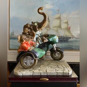 Elephant on the motorcycle figurine